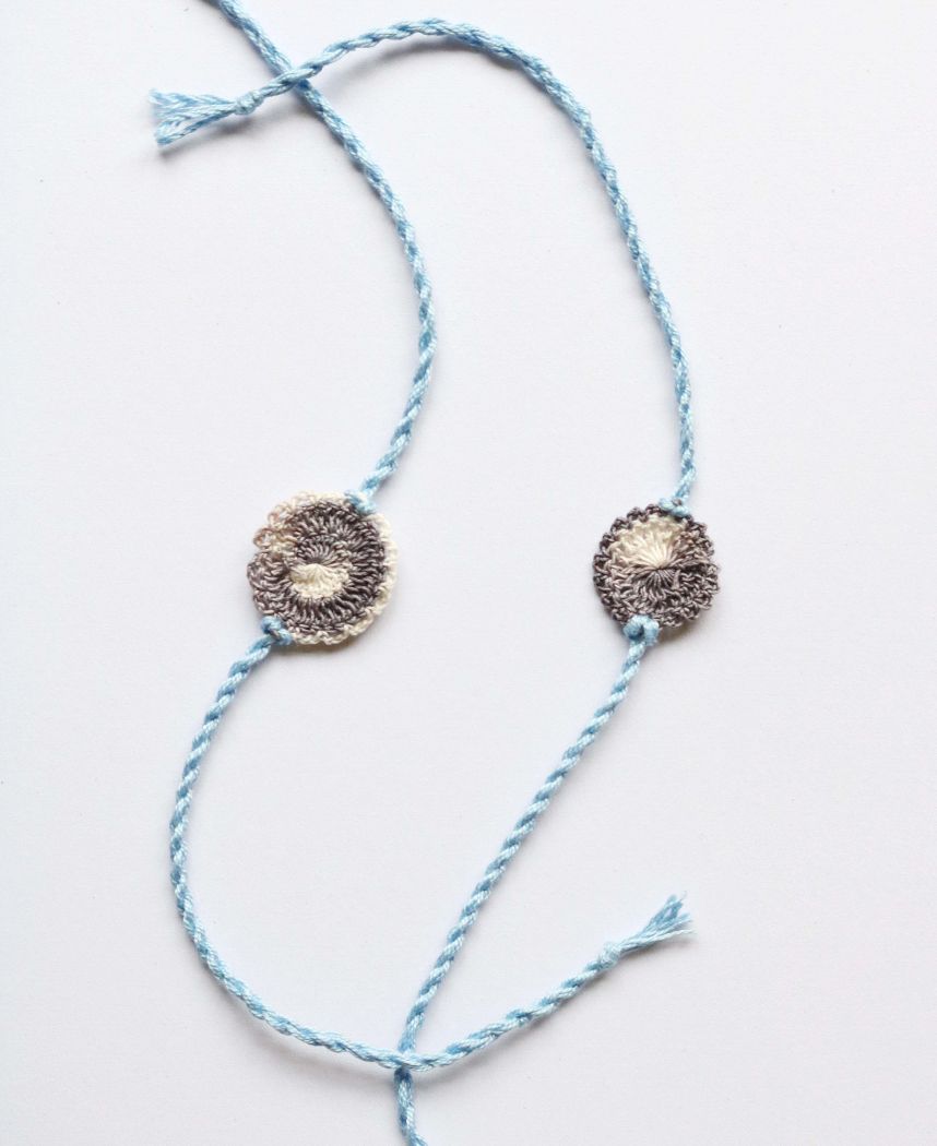 Grey White Rakhi Set
